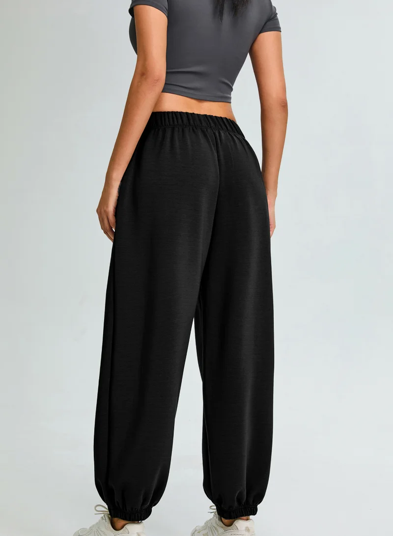 Kawn.yoga Licorice Black Mid Waist Oversized Joggers for Women | Best Price UAE